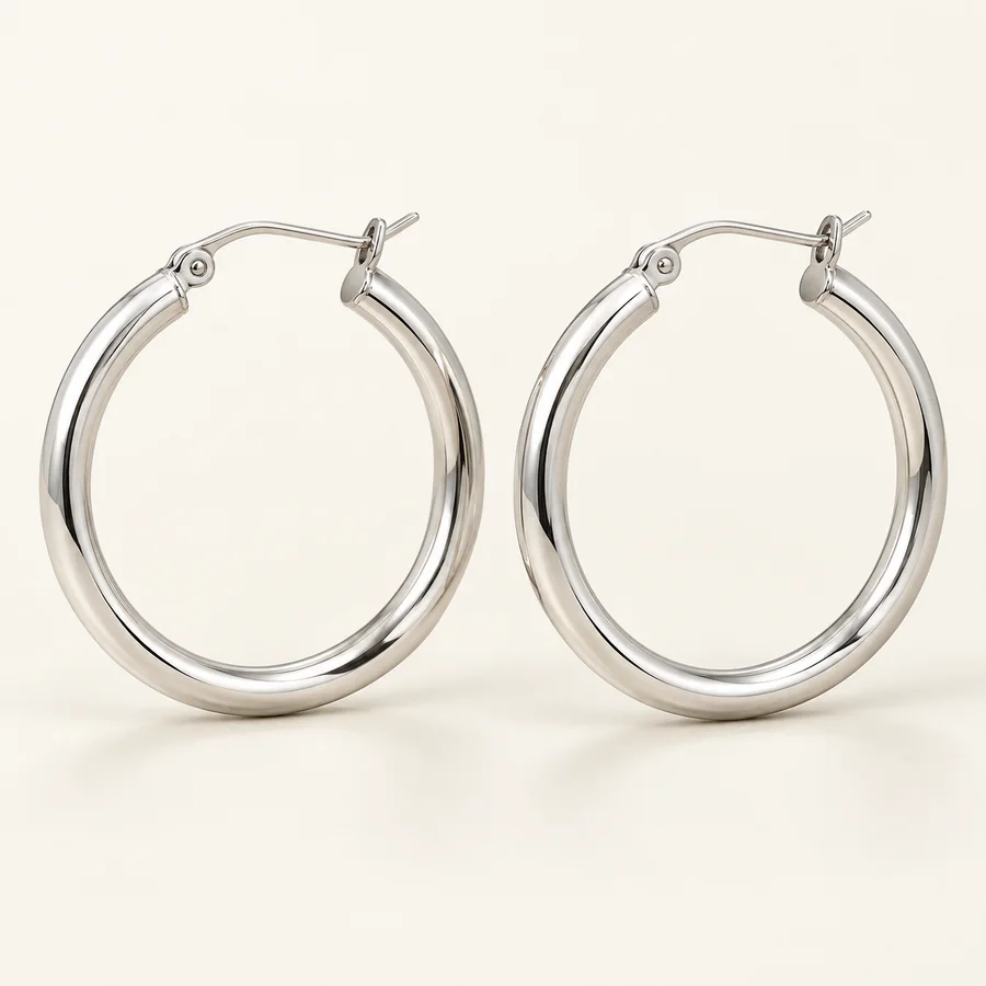 Aros plateados grandes · Mujer